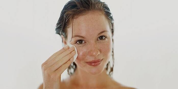 applying oil to facial skin for rejuvenation